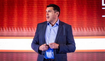 Raúl Gamboa, head of logistics at BMW Group’s San Luis Potosí Plant, on stage at Finished Vehicle Logistics North America conference 2026.